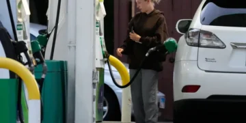 Gas station price boards showing falling fuel prices - AP Photo/Nam Y. Huh