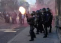Protesters and police clash ahead of G7 summit near Geneva - AP Photo/Baz Ratner
