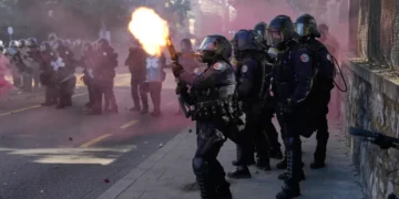 Protesters and police clash ahead of G7 summit near Geneva - AP Photo/Baz Ratner