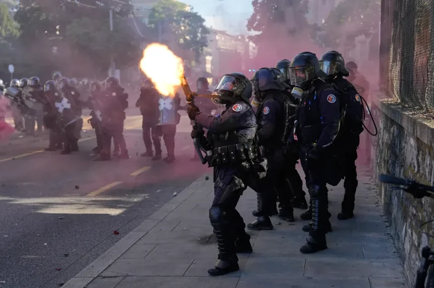 Protesters and police clash ahead of G7 summit near Geneva - AP Photo/Baz Ratner