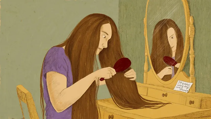 Woman brushing long hair as part of daily care - BBC/ Prashanti Aswani