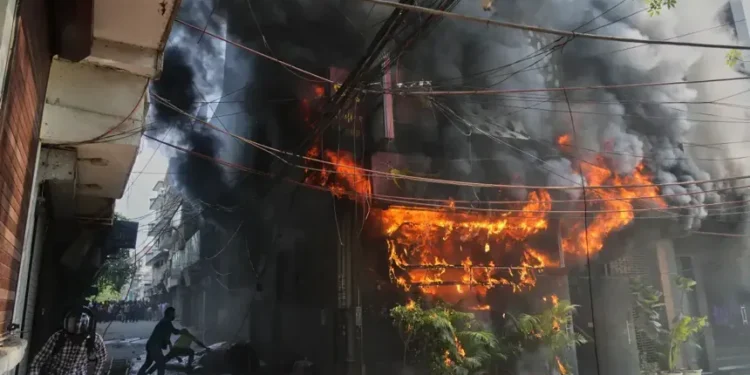 Firefighters respond to deadly building fire in New Delhi - AP Photo/Manish Swarup
