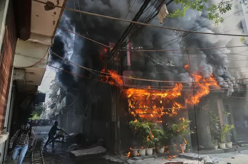 Firefighters respond to deadly building fire in New Delhi - AP Photo/Manish Swarup