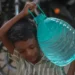 Residents collect water as delayed monsoon affects Indian cities and farms - AP Photo/Rafiq Maqbool