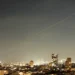 Smoke rises after reported strikes in Iran - AP Photo/Ohad Zwigenberg
