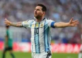 Lionel Messi celebrates after scoring against Algeria at World Cup