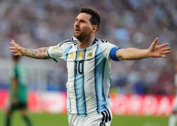Lionel Messi celebrates after scoring against Algeria at World Cup