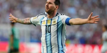 Lionel Messi celebrates after scoring against Algeria at World Cup