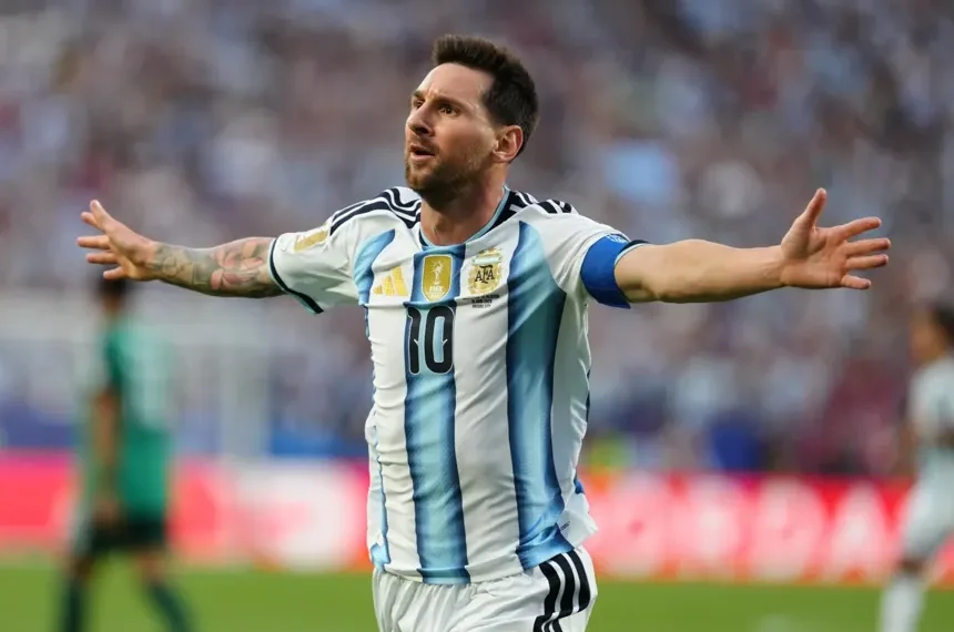 Lionel Messi celebrates after scoring against Algeria at World Cup
