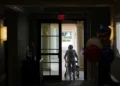 Patient reviewing Medicaid coverage requirements after federal policy changes - AP Photo/Rebecca, Blackwell, File