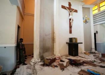 Security personnel outside church targeted in deadly Nigeria attack - AP Photo/Sunday Alamba, File