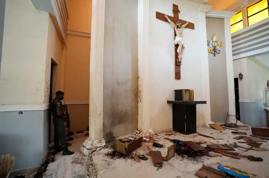 Security personnel outside church targeted in deadly Nigeria attack - AP Photo/Sunday Alamba, File