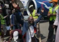 Nigerian migrants arrive home after returning from South Africa - AP Photo/Sunday Alamba