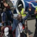 Nigerian migrants arrive home after returning from South Africa - AP Photo/Sunday Alamba