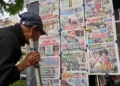 Election workers process ballots during Peru presidential runoff count - AP Photo/Rodrigo Abd