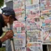 Election workers process ballots during Peru presidential runoff count - AP Photo/Rodrigo Abd