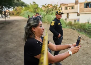Police respond to crime scene ahead of Peru election - AP Photo/Rodrigo Abd