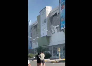 Damaged structures after powerful earthquake in southern Philippines - Ernesto Torres Jr via AP
