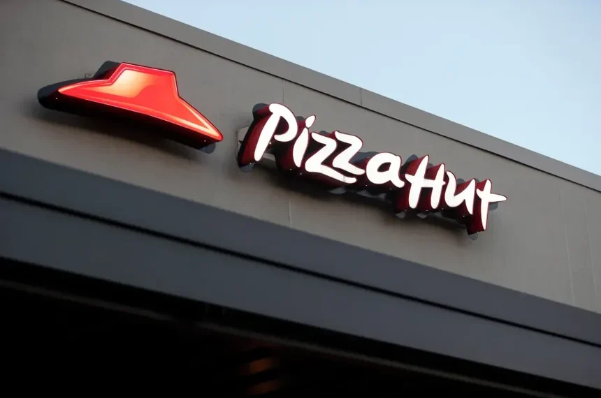 Pizza Hut restaurant exterior following Yum Brands sale announcement - AP Photo/Gerald Herbert, File