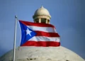 Puerto Rico officials face scrutiny amid political controversy - AP Photo/Ricardo Arduengo, File