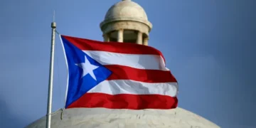 Puerto Rico officials face scrutiny amid political controversy - AP Photo/Ricardo Arduengo, File