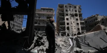 Residents inspect damaged homes in southern Lebanon - AP Photo/Hassan Ammar