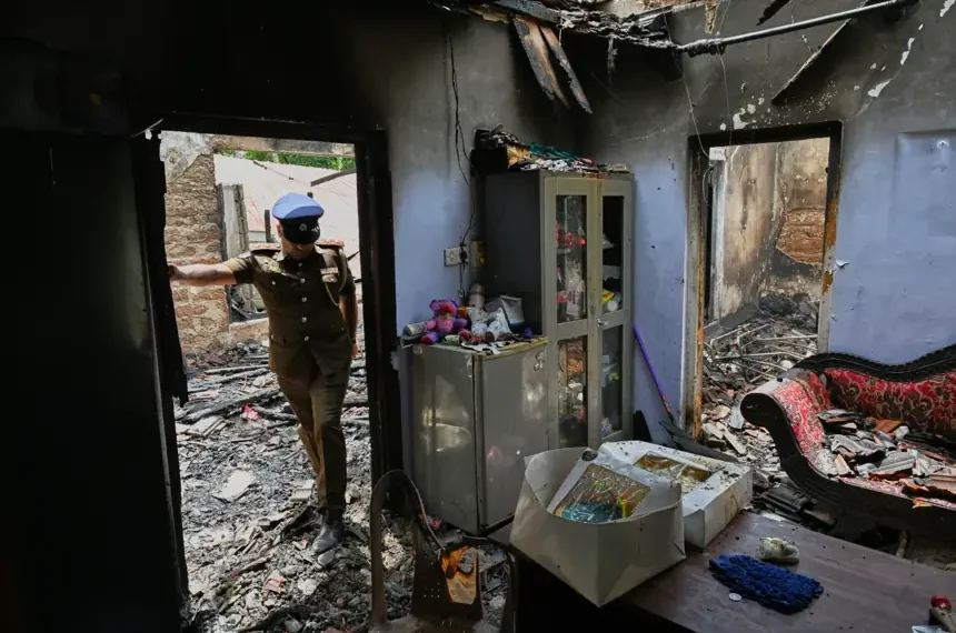 Fire-damaged nursing home building in Sri Lanka after deadly blaze - AP Photo