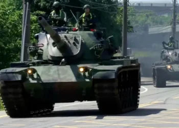 Taiwanese tanks patrol streets during military readiness exercise - SET TV via AP