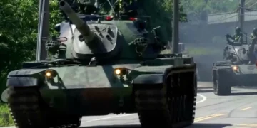 Taiwanese tanks patrol streets during military readiness exercise - SET TV via AP