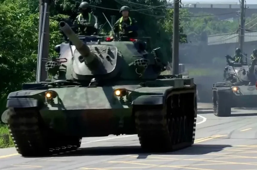 Taiwanese tanks patrol streets during military readiness exercise - SET TV via AP