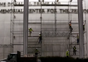 Workers remove Trump’s name from the Kennedy Center facade - AP Photo/Rahmat Gul