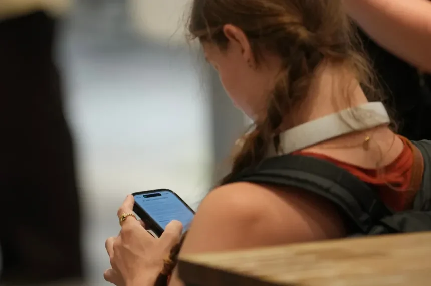 UK announces under-16 social media ban policy - AP Photo/Kin Cheung