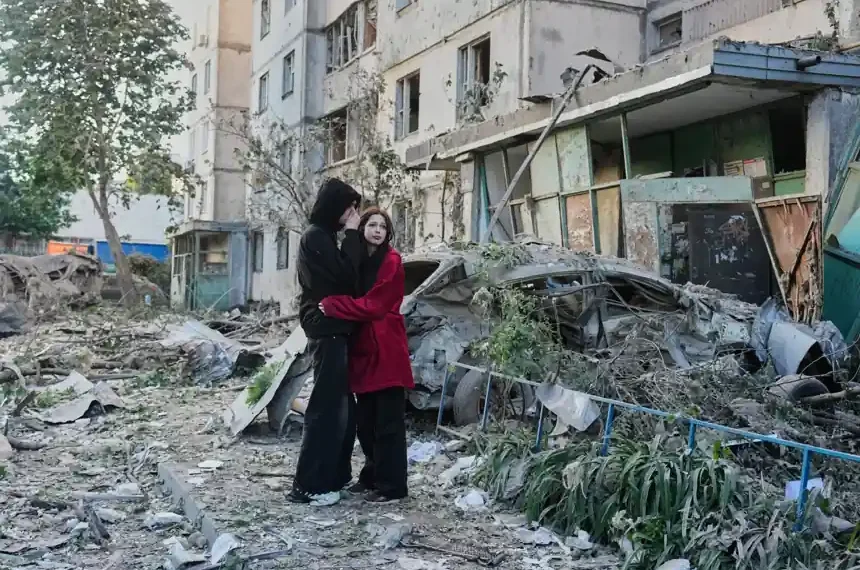 Rescue workers search damaged building after Russian strike in Kyiv - AP Photo/Efrem Lukatsky