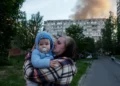 Emergency crews respond after Russian strikes hit Kyiv - AP Photo/Evgeniy Maloletka