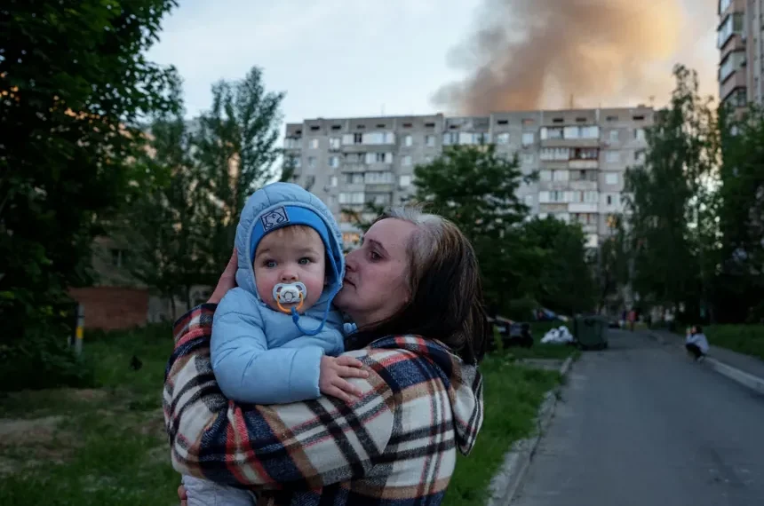 Emergency crews respond after Russian strikes hit Kyiv - AP Photo/Evgeniy Maloletka