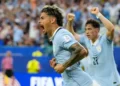 Uruguay and Saudi Arabia players contesting World Cup Group H match - AP Photo/Lynne Sladky