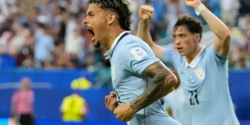 Uruguay and Saudi Arabia players contesting World Cup Group H match - AP Photo/Lynne Sladky