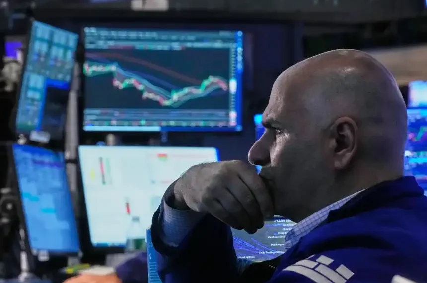 Traders monitor rising U.S. stock indexes during Wall Street trading session. - AP Photo/Richard Drew