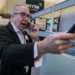 Traders monitor U.S. stock indexes amid falling oil prices - AP Photo/Richard Drew