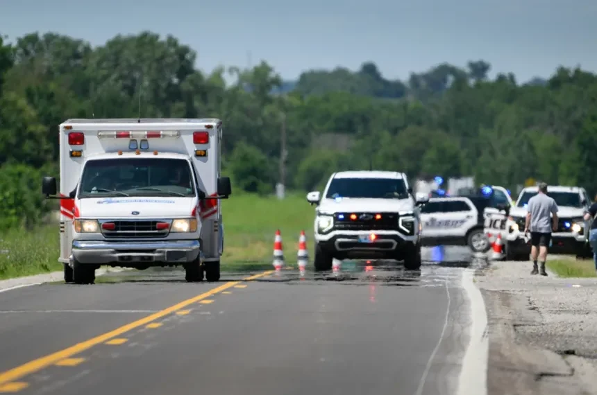 Crash investigation at Missouri skydiving airport site - AP Photo/Reed Hoffman