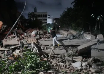 Damaged buildings and emergency response efforts after earthquakes in Caracas - AP Photo/Adrian Naranjo