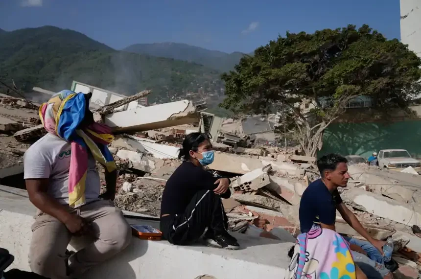 Venezuelan families shelter outdoors after devastating earthquakes damaged homes - AP Photo/Ariana Cubillos