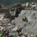 Rescue workers search collapsed buildings after devastating Venezuela earthquakes. - AP Photo/Matias Delacroix
