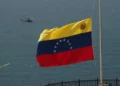 Rescue workers search collapsed hotel after deadly earthquakes in Venezuela. - AP Photo/Delacroix