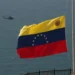 Rescue workers search collapsed hotel after deadly earthquakes in Venezuela. - AP Photo/Delacroix