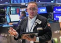 Traders monitor stock market performance as AI shares decline. - AP Photo/Richard Drew