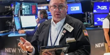Traders monitor stock market performance as AI shares decline. - AP Photo/Richard Drew
