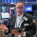 Traders monitor stock market performance as AI shares decline. - AP Photo/Richard Drew