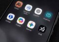 AI chatbot applications displayed on a smartphone screen. — Photo: JournosNews (File)