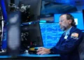Traders monitor U.S. stock market as AI shares lift major indexes higher. - AP Photo/Seth Wenig